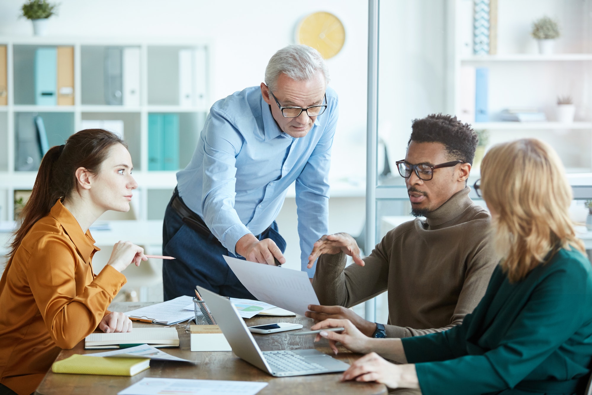 Business people discussing business contract